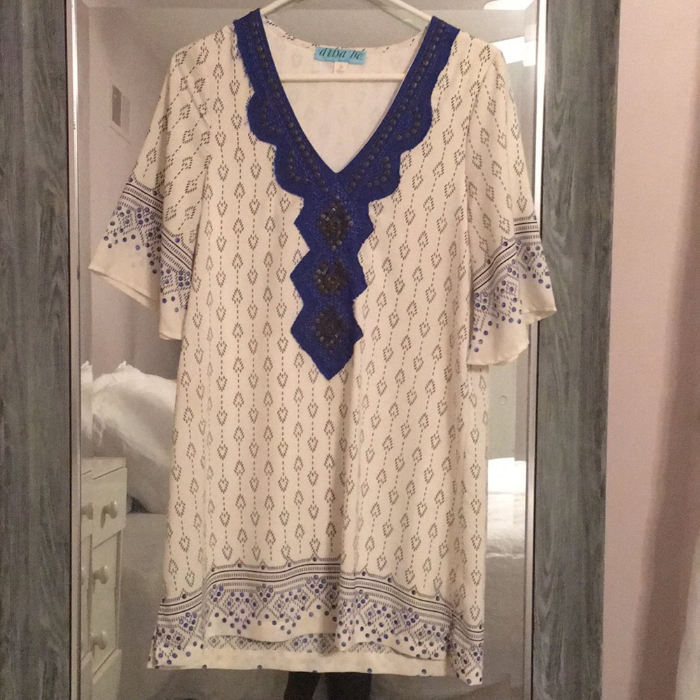 Francesca’s patterned V neck dress